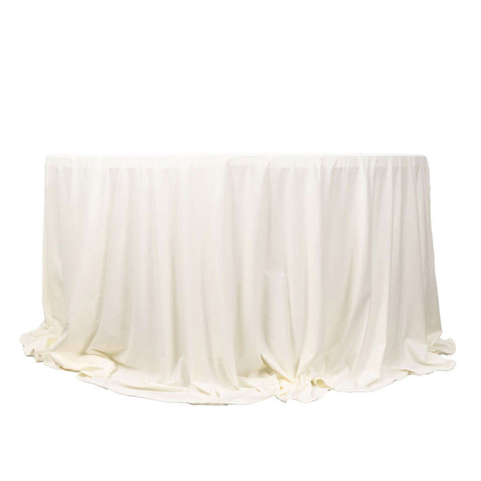 White tablecloth draped elegantly over a round table