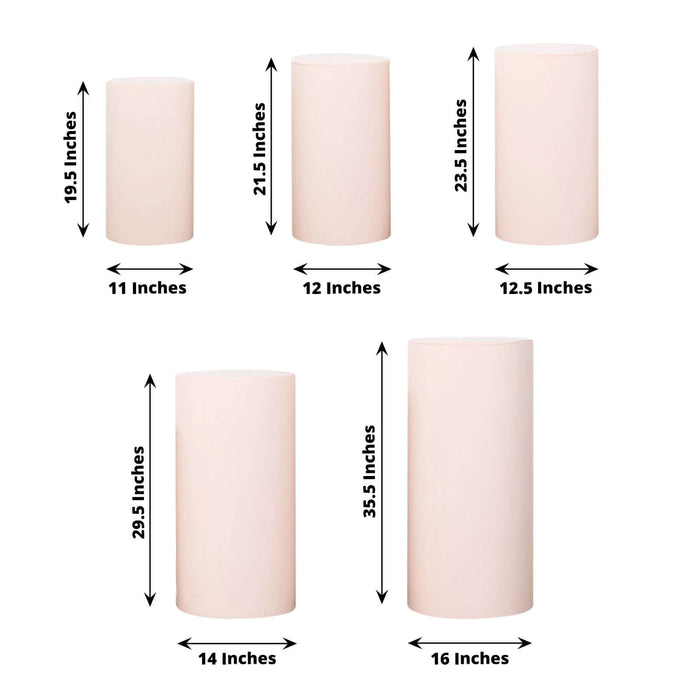 Set of decorative candles in various heights and sizes on a white background.
