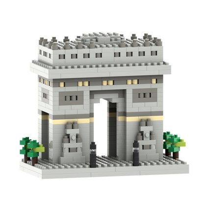 The Brixies Small Gift Box Arc De Triomphe is a micro-brick kit featuring light grey bricks, detailed accents, and two green trees at the base—perfectly capturing the iconic elegance of Paris’s famous monument.