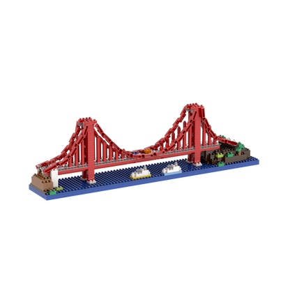 Brixies Small Gift Box Golden Gate Bridge is a micro-brick kit to build a 3D miniature of the iconic bridge, with red towers, cables, blue water base, and tiny boats for extra detail.