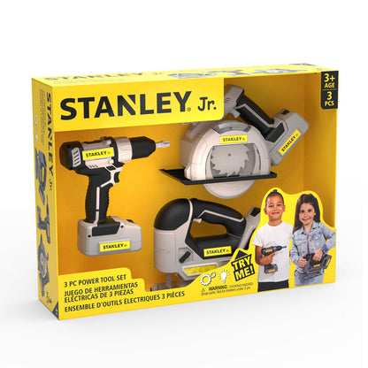 The Stanley Jr. Power Tool Set by Red Toolbox includes a battery-operated toy drill, saw, and sander in yellow packaging with two smiling kids on the box. Ideal for pretend play and recommended for ages 3+.