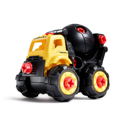 The Stanley Jr. Take Apart Classic Cement Mixer by Red Toolbox features a yellow and black design with red accents, large wheels, and a rotating black drum, shown on a white background.