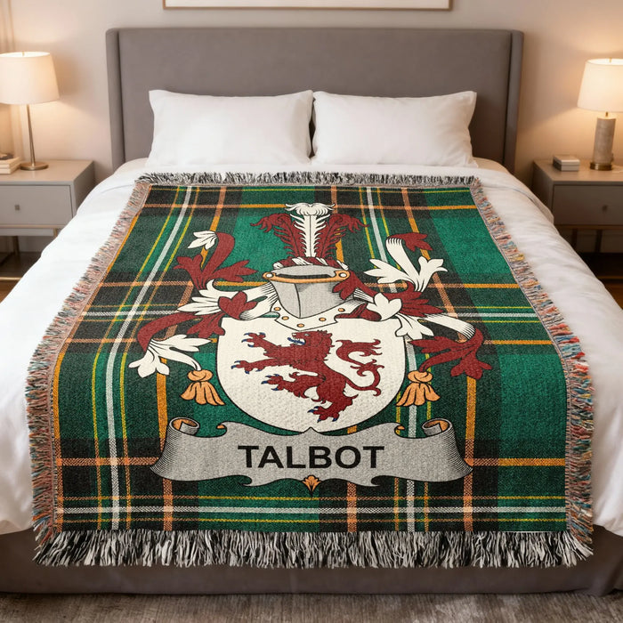 Talbot Irish family crest woven blanket displayed on a bed.