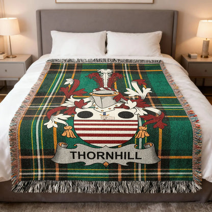 Thornhill Irish family crest woven blanket displayed on a bed.