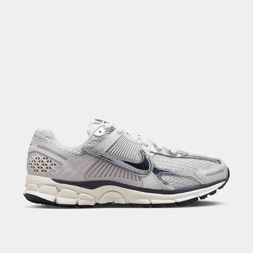 Side view of the Nike Women's Zoom Vomero 5.